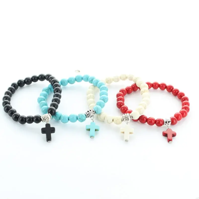 Bracelet avec pierres colorées et croix religieuse