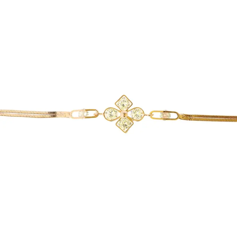 Bracelet doré avec une croix en zircon