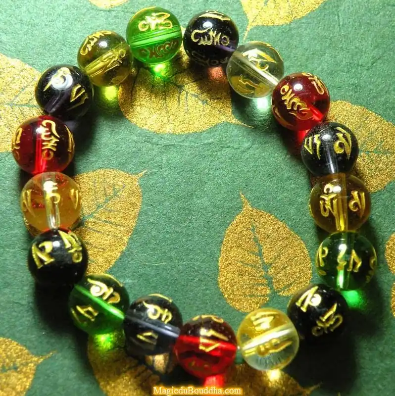 Chenrezi mantra wrist mala in colored glass.