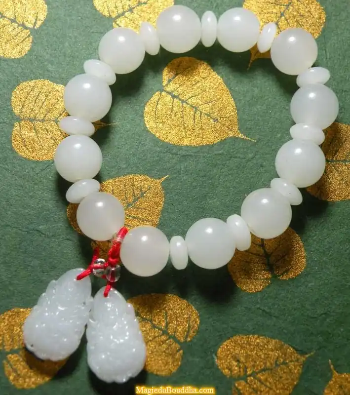 White glass Guan Yin wrist mala.