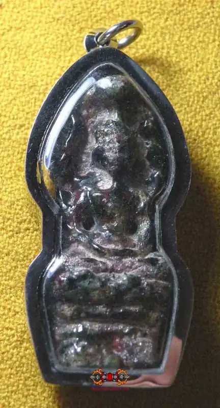 Large Thai amulets of the Buddha Phra Naphrok in alchemical glass Met Rae.