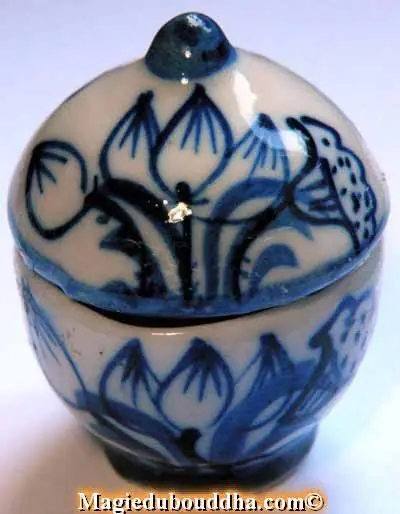 Small blue and white ceramic reliquary urns.