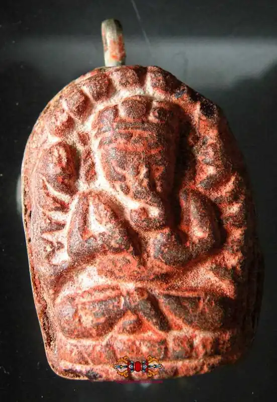 Tibetan Ganesh amulet pendants made of glass paste.