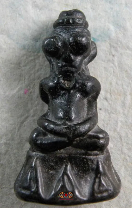 Ancient black Thai Phra Ngang amulet.