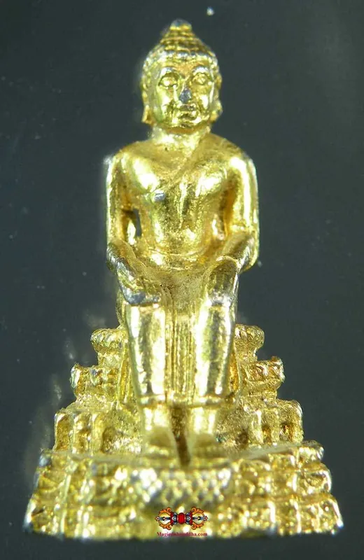 Golden amulet of Buddha Maitreya.