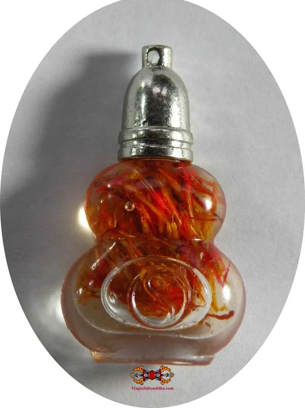 Magical Charm Oil of the Most Venerable Phra Maha Kananamtham Panyathiwat.