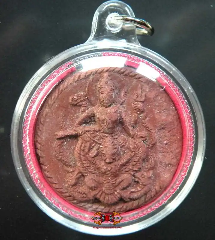 Red amulet of Shiva mounted on a Garuda.