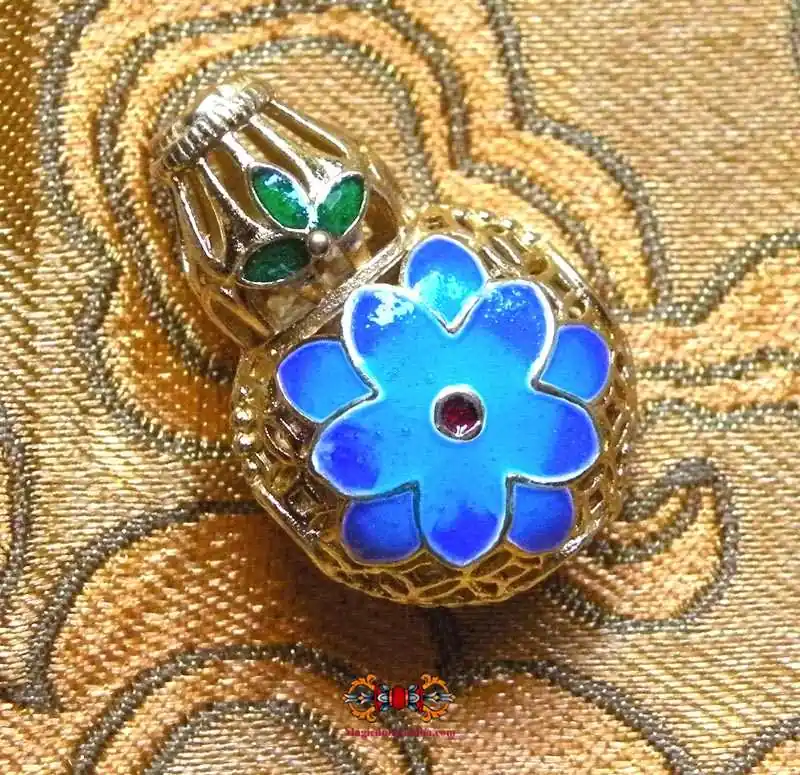 Tibetan mala head bead - cloisonné floral decoration.