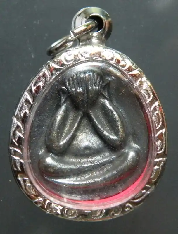 Thai amulet of the protective Buddha Phra Pidta - Wat Phu Manorom.