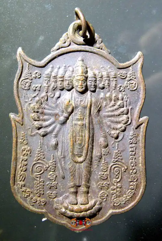 Large medal of Vishnu with many faces (Vishvarupa).