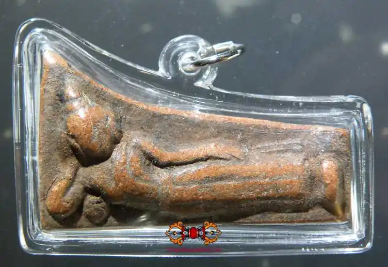 Ancient amulet of the reclining Buddha Phra Nön.