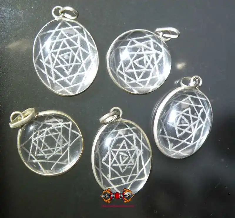 Shri Yantra pendant in rock crystal (quartz).