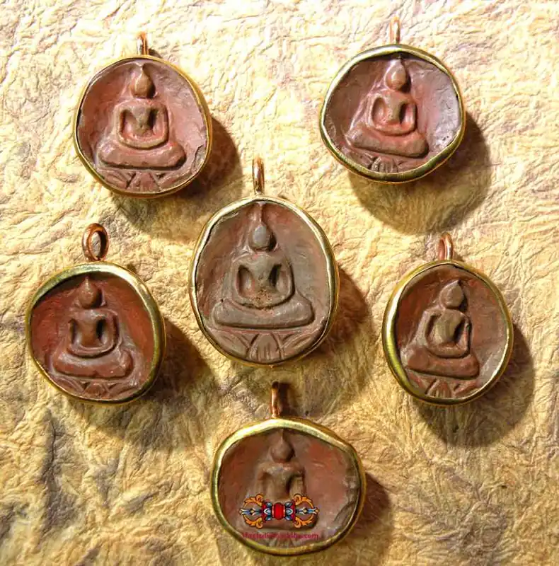 Round Phra Somdej amulets in Hin Phratat relic stone.