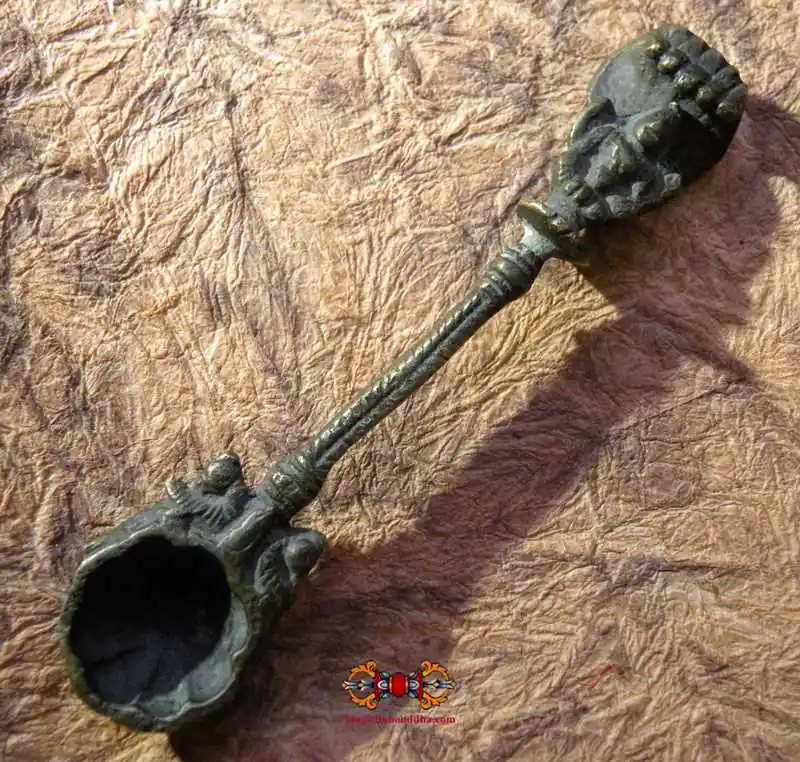 Bronze offering spoon - Hindu ritual object.