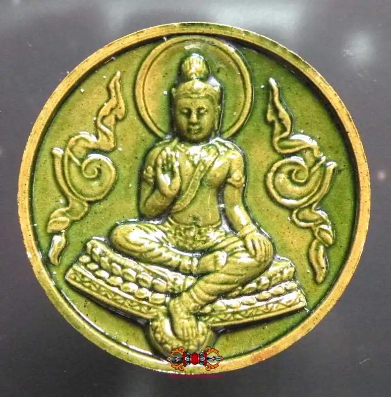 Large green ceramic Jatukham Rammathep amulet.