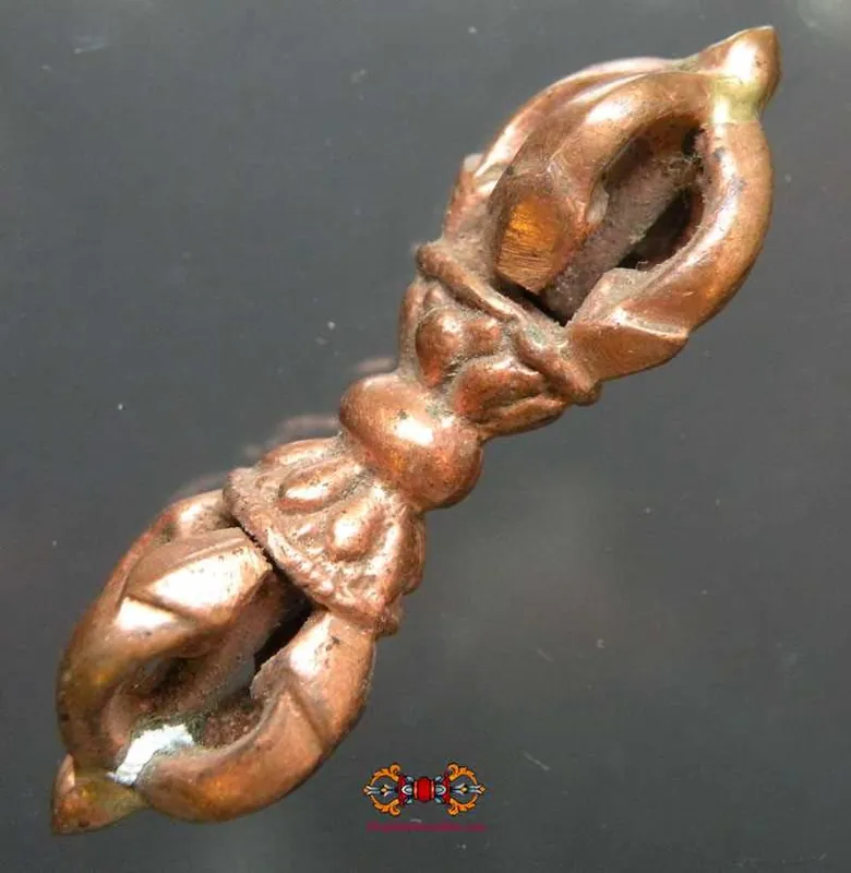 Small copper Vajra.
