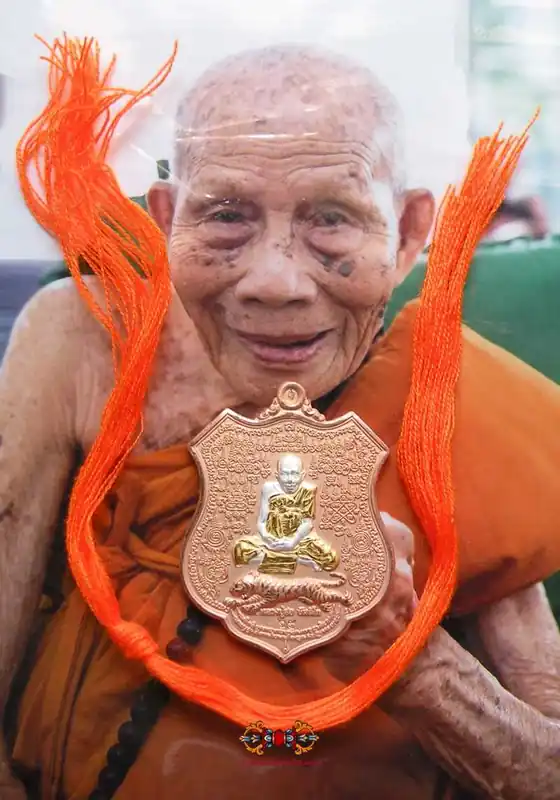 Precious medal portrait of Roop Lor with six tigers - Very Venerable LP Saur.