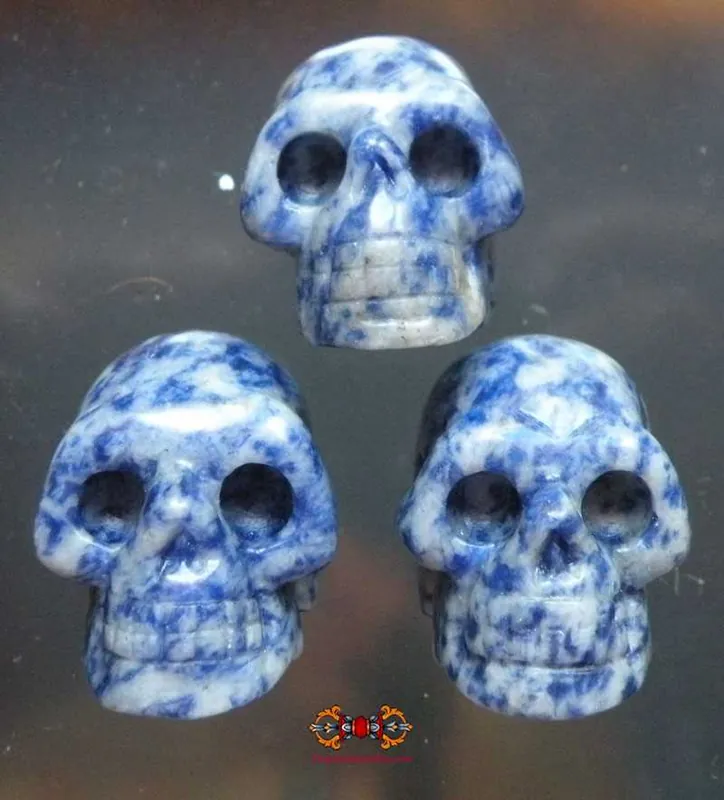 Human skull carved from blue stone (sodalith).