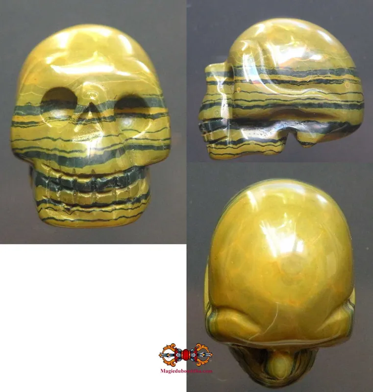 Human skull carved from iron eye (tiger's eye + hematite).