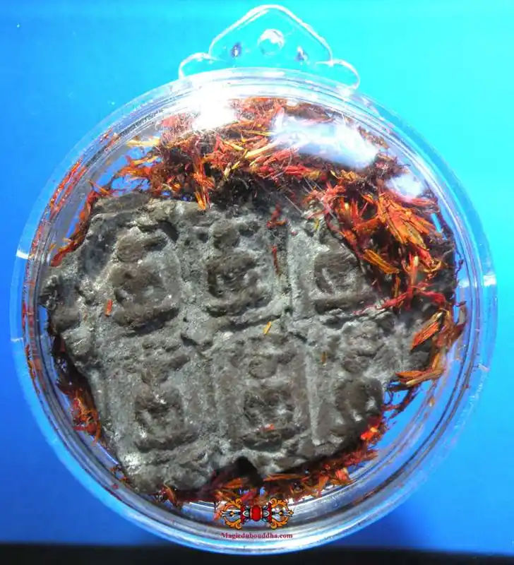 Fragment of an ancient Buddhist votive tablet from Thailand.
