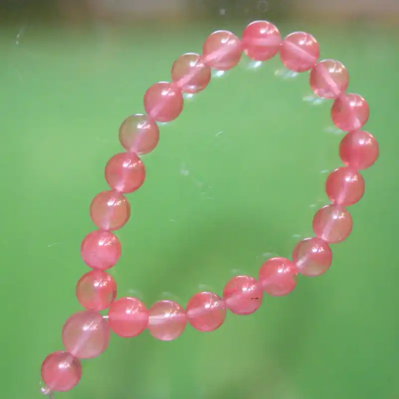 Strawberry quartz Buddhist wrist rosary.