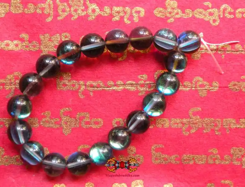 Buddhist wrist rosary in opalized blue glass.