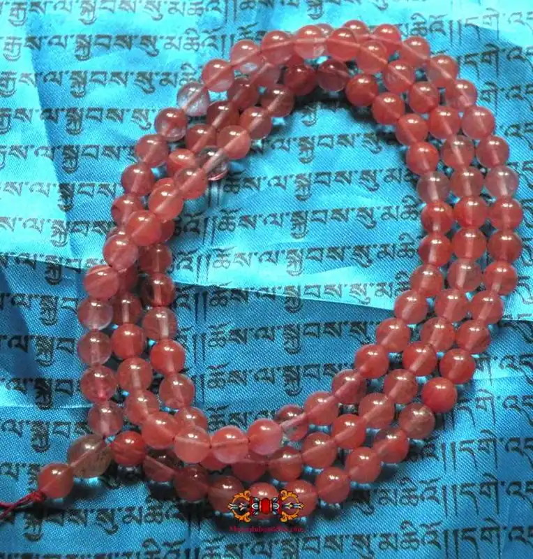 Large Buddhist rosary in strawberry quartz.