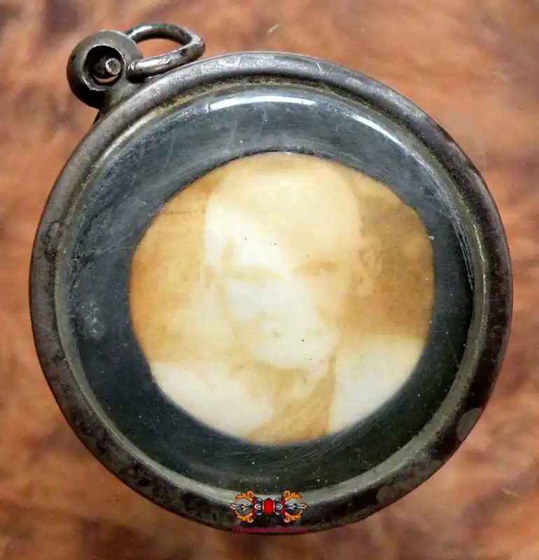 Portrait amulet and relics of the Most Venerable LP Tim (Wat Lahanrai).