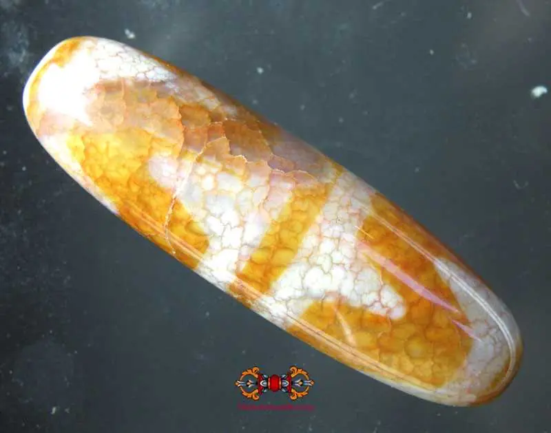 Large orange Tibetan Dzi - type: Tiger Skin.