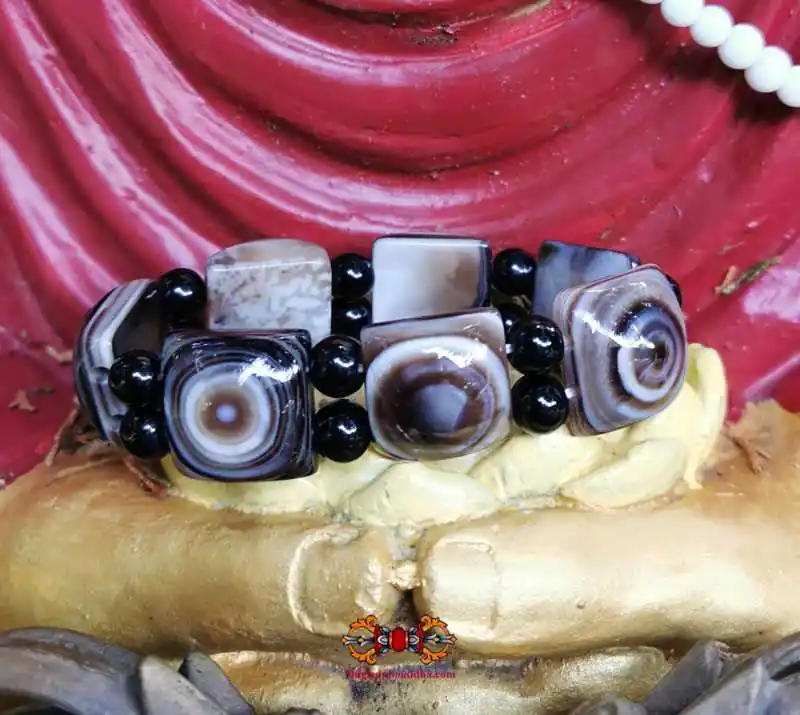 Tibetan bracelet with seven large magic agate eyes.