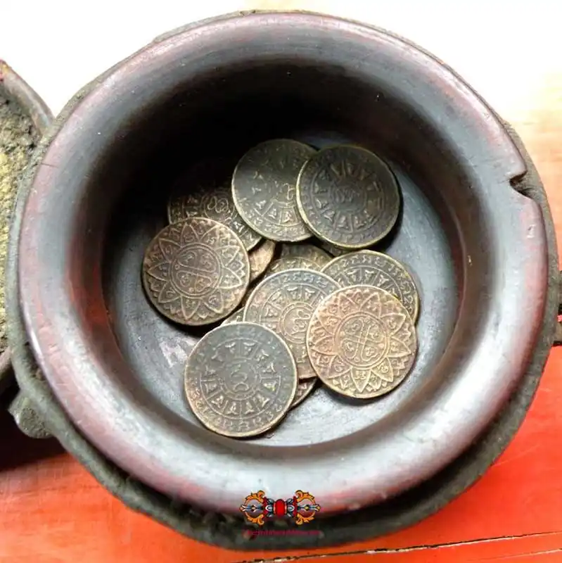 Ancient Thai temple fortune coins.