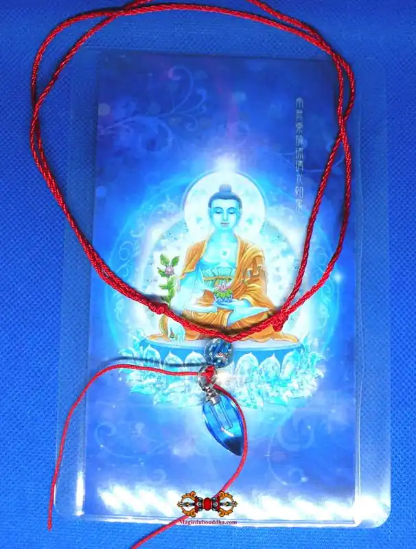 Sangye Menla Buddha Ringsel health amulet.