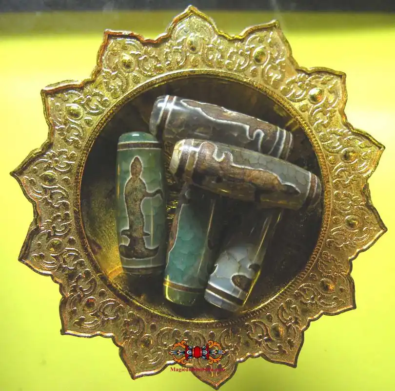 Sacred Dzi beads of the protector Guan Yin.
