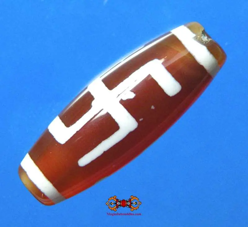 Long red Dzi with Swastika decoration - Bönpo tradition.