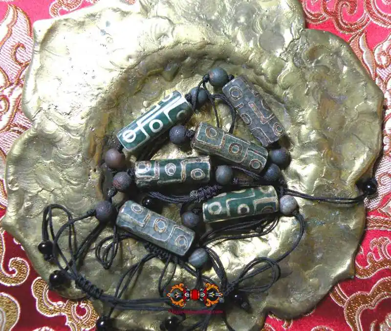 Tibetan bracelet with nine-eyed Dzi.