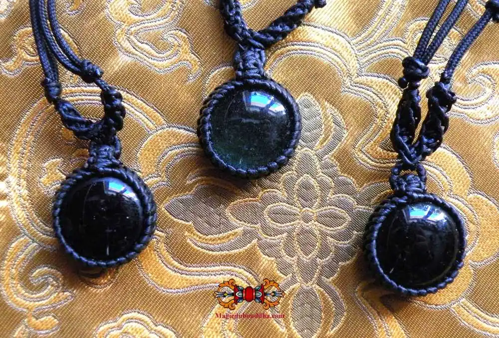 Thai necklaces with alchemical glass cabochon - green and black.