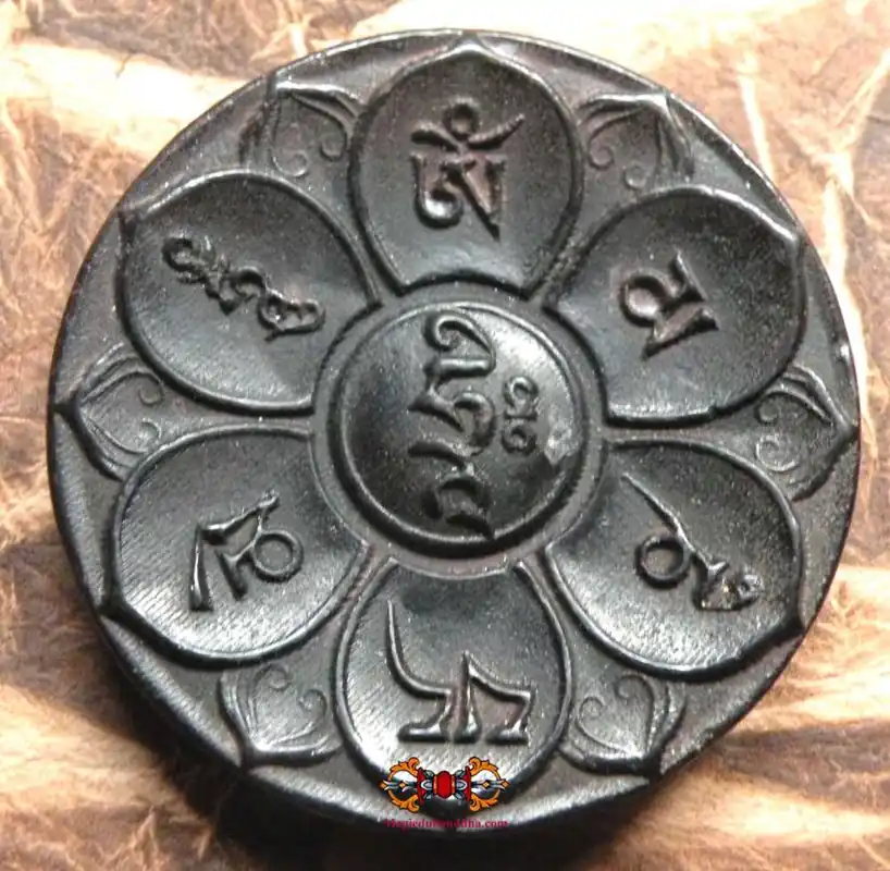 Large Tibetan Thogchag amulet of the Chenrezig mantra.