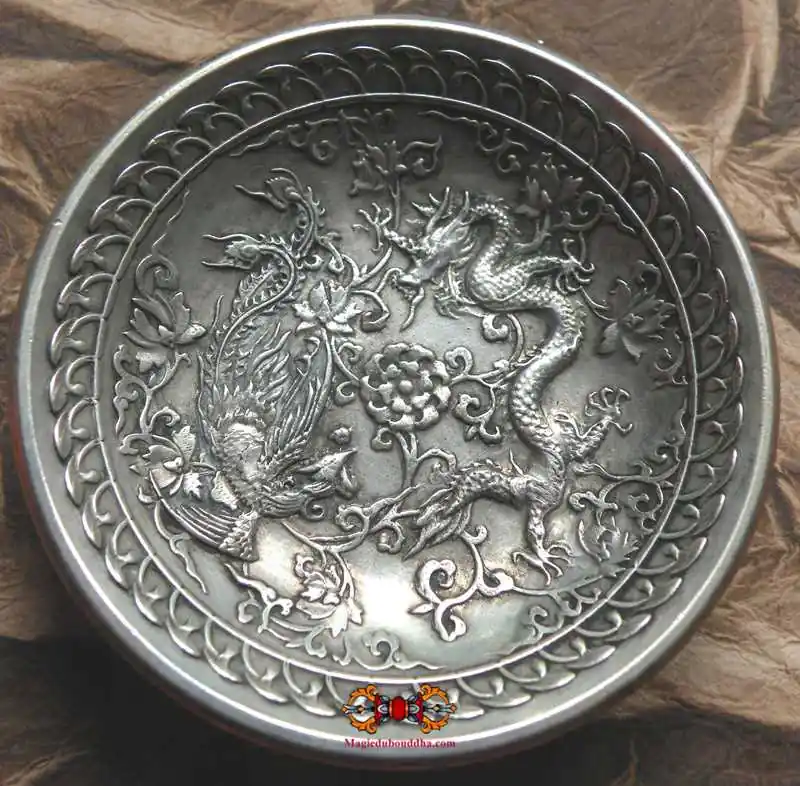 Chinese ritual offering cup in silver-like metal.