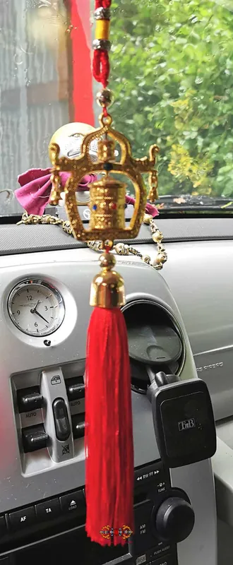 Tibetan prayer wheel for car.