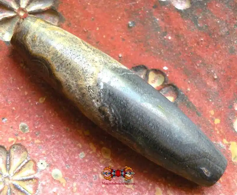 Large Dzi-shaped stone bead from Tibet.