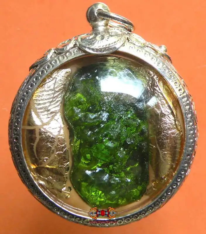 Small sacred green Naga stones - beads and pendants.