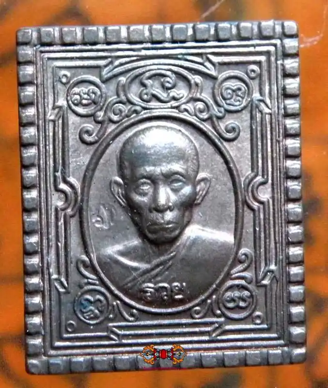 Thai fortune amulet in the shape of a stamp - Most Venerable LP Ruay.