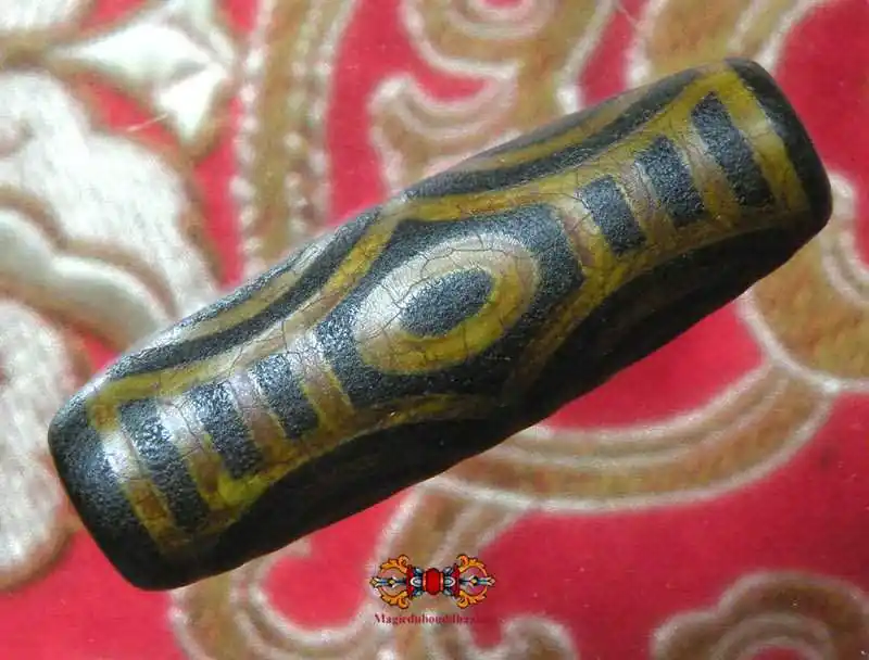 Sacred Tibetan Dzi beads "6-eyed dragon eye".