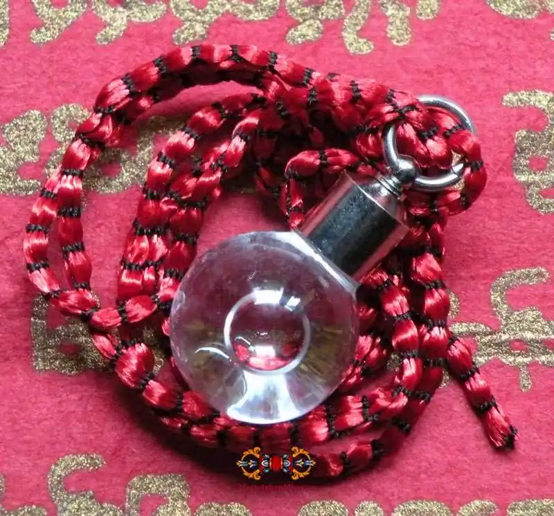 Sacred pendant containing blessed Nam Mön water from the 108 temples - Wat Hong Rathanaram