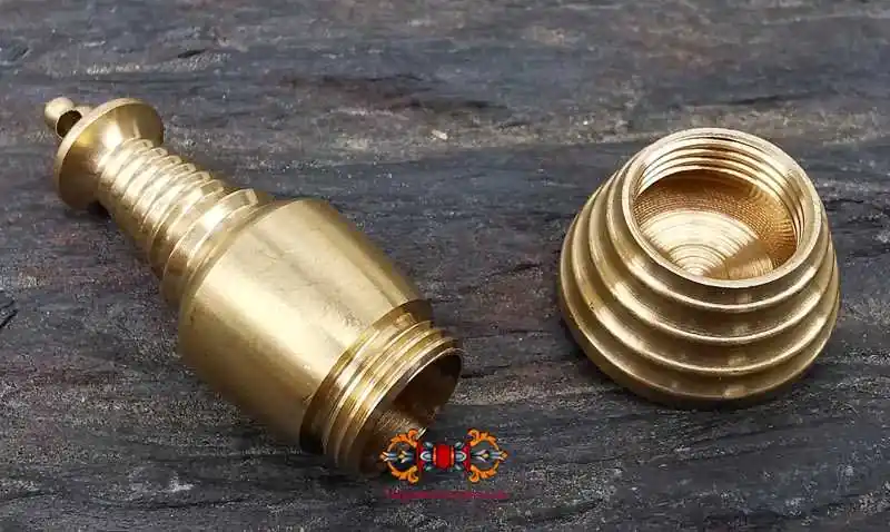 Small Tibetan stupa reliquary in brass.