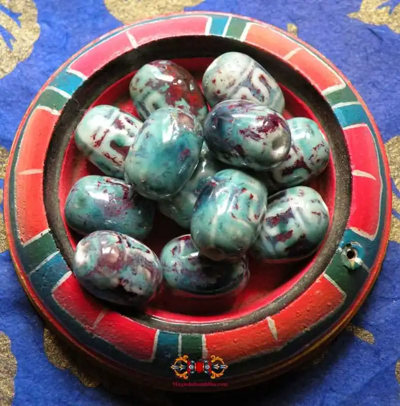 Tibetan ceramic beads in turquoise color.