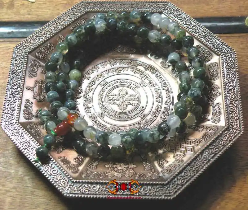 Buddhist rosary made of moss agate.
