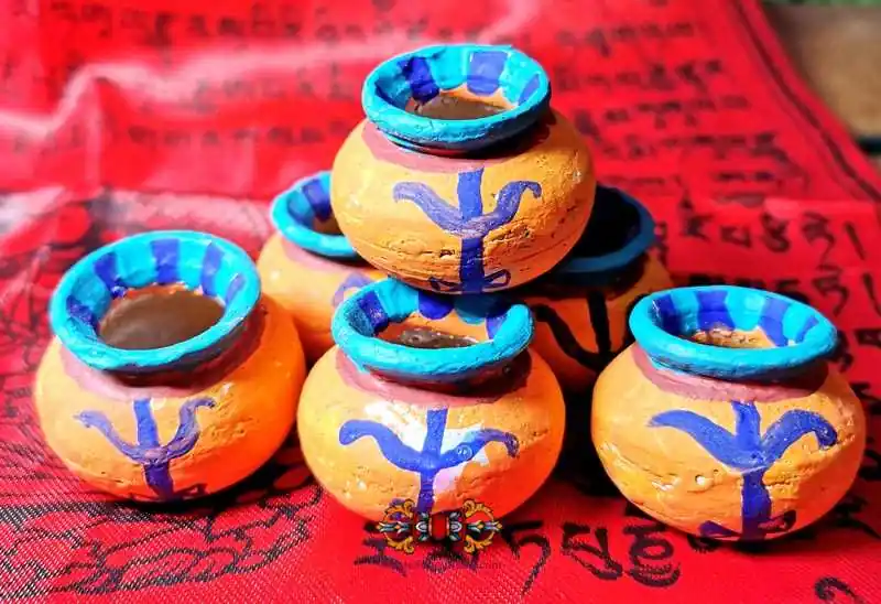 Saddhu's offering pots.