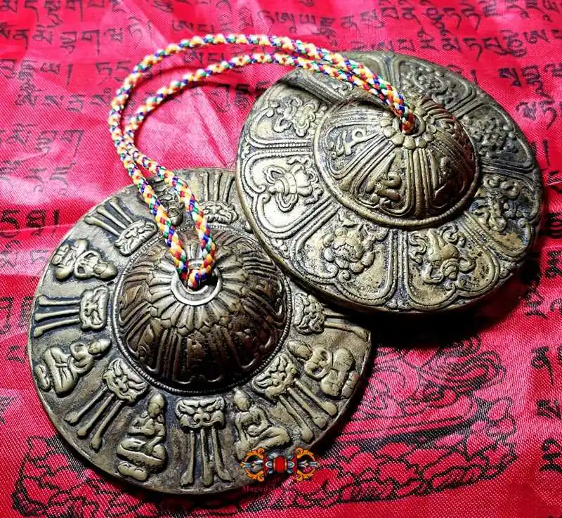 Pair of antique Tibetan ritual tingsha cymbals.