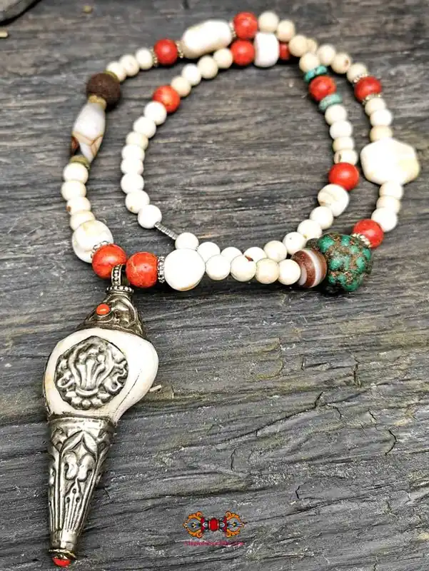 Tibetan ethnic necklace with conch pendant.